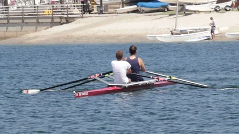 Doubles Rowers Glide Along Bay in San Diego Bay Waters Stock Footage 108742923