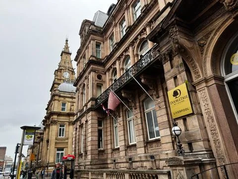 DoubleTree by Hilton hotel facade with clock tower and historic Victorian a.. Stock Photos