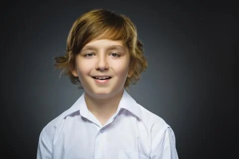 Doubt, expression and people concept - boy thinking over gray background Foto stock
