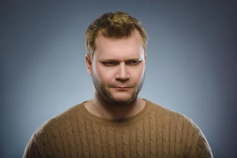 Doubt, expression and people concept - man thinking over gray background Foto stock