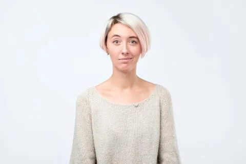 Doubt, mistrust, distrust concept. Doubtful woman looking with disbelief Foto stock
