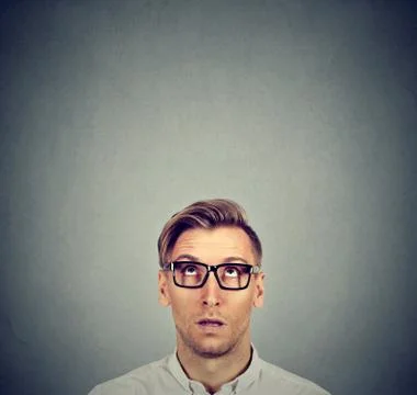 Doubtful man looking impressed Stock Photos