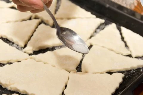 Dough on a baking sheet on the cookie Stock Photos