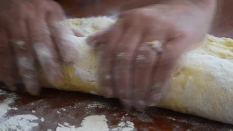 Dough on the baking table in flour Stock Footage 158003981