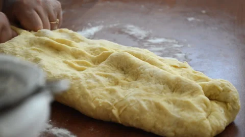 The dough is on the baking table. . Stock Footage 158745040