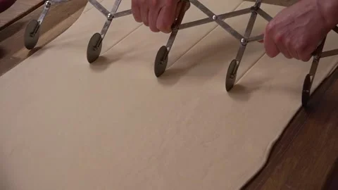 Dough being cut with a bakery machine Stock Footage 239644509