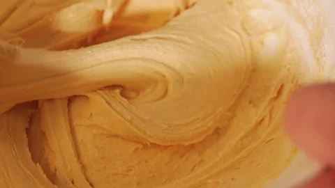 Dough being mixed with a whisk Stock Footage 152578745
