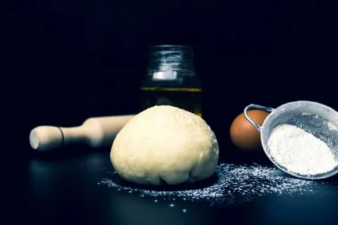 Dough on a black background close up Foto stock