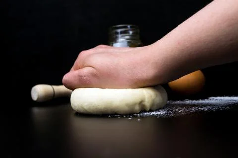 Dough on a black background close up Stock Photos