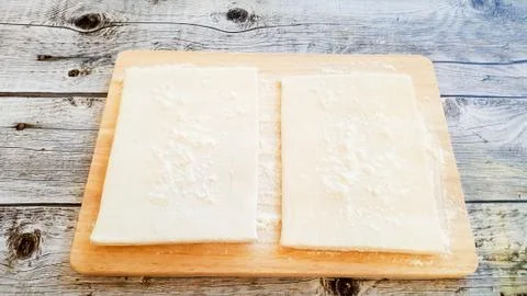 Dough on the board. Photos