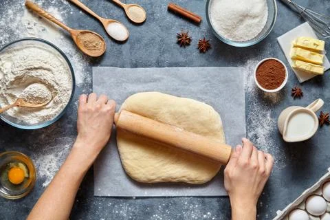 Dough bread, pizza or pie recipe homemade preparation. Female baker hands Stock Photos