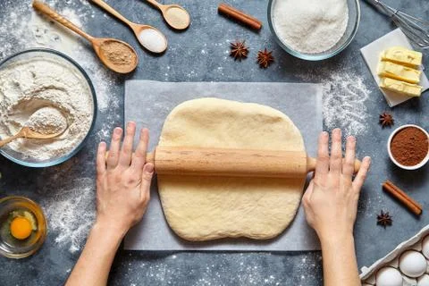 Dough bread, pizza or pie recipe traditional preparation. Female chef cook hands Stock Photos