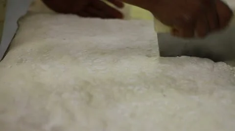 Dough cutting Stock Footage 9457402