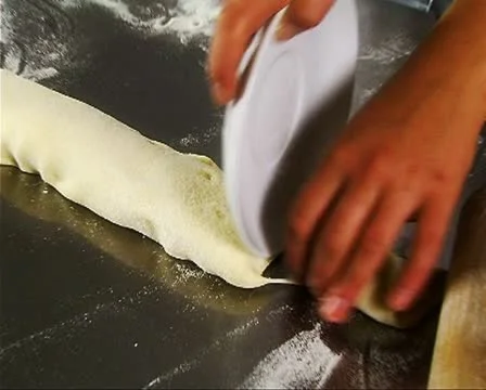 Dough cutting Stock Footage 10717904