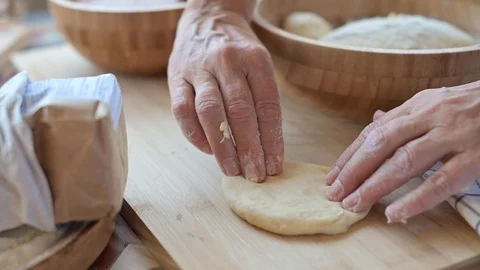 Dough in female hands Stock Footage 117174725
