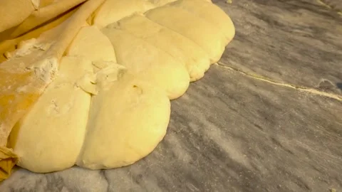 Dough in flour on the table Stock Footage 241411324
