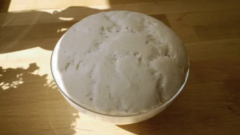 The dough grows in time lapse Stock Footage 127722149