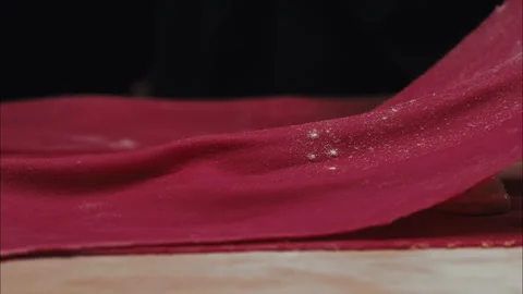 Dough Kneading and Spreading Beet Dough Stock Footage 254938564
