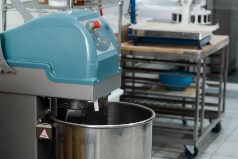Dough kneading machine for automatic mixing flour with other ingredients Stock Photos
