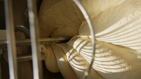 Dough kneading machine in a bakery close-up view of the mixing process Stock Footage 313534673