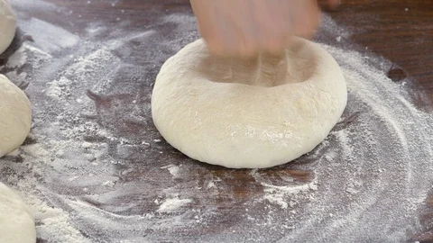 From the dough make a pizza billet Stock Footage 88629572