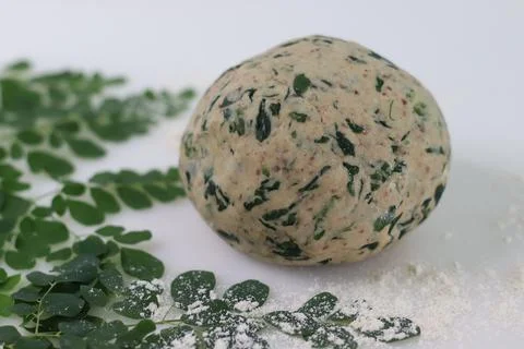 Dough for making Indian flat bread, made of whole wheat flour and spices with Stock Photos