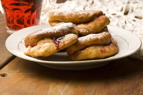 Dough with marmelade on wooden board Stock Photos