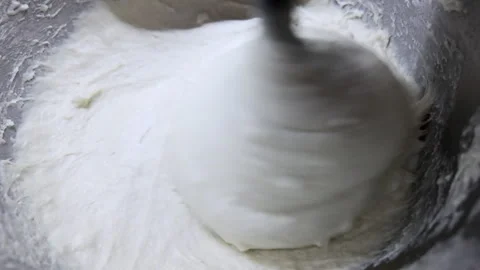 Dough mixing machine working during professional bakery food preparation Stock Footage 328803760