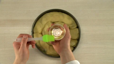 Dough oiling by cooking brush. Stock Footage 63138503