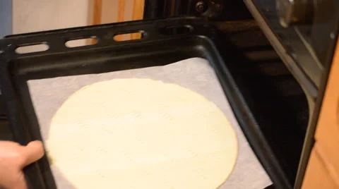 Dough Into The Oven Stock Footage 52274980