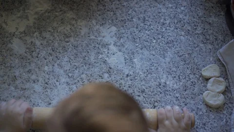 Dough for pizza and bread. Rough pin. Baby arms. Stock Footage 115846365