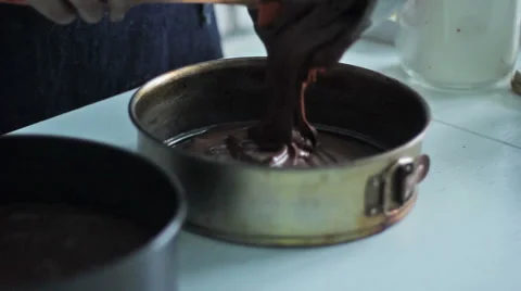 Dough is poured in a form for cake Stock Footage 45592005