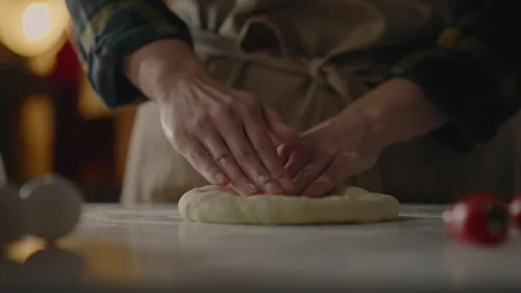 Dough preparation, Baker's quick preparation Forms a round dough shape by ha Stock Footage 249843593