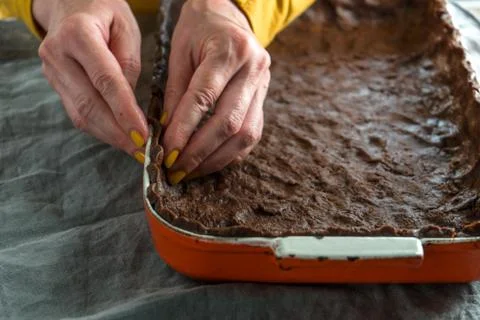 Dough for pumpkin pie in the form for baking close-up Foto stock