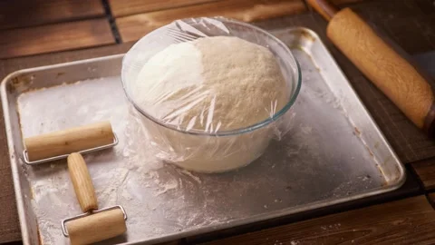 Dough rise timelapse wrapped in plastic secret recipe for optimal growth 動画素材 149787004