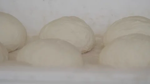 Dough rising in a kitchen before baking bread Stock Footage 325929047