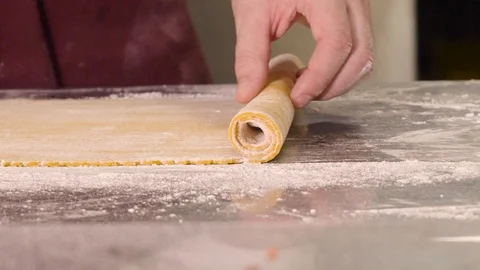 The dough is rolled into a straw Video stock 107890909