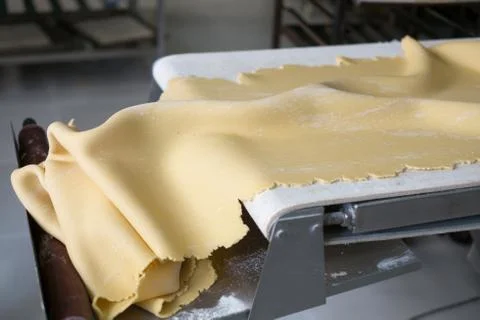 Dough Rolling Machine with Pie Dough Stock Photos