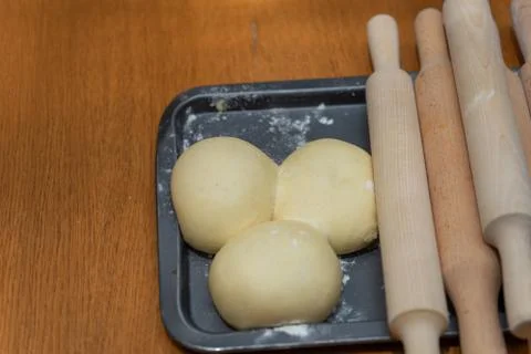 Dough, rolling pin, baking sheet, baking concept Foto stock