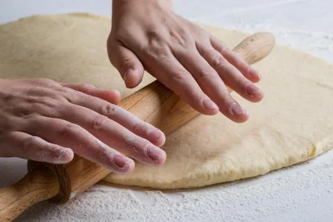Dough with rolling pin Stock Photos