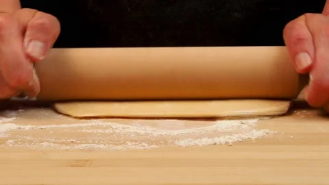 The dough rolling the women's hand Stock Footage 239174376