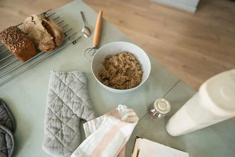 Dough for rye bread in a plate on the kitchen table Stock Photos