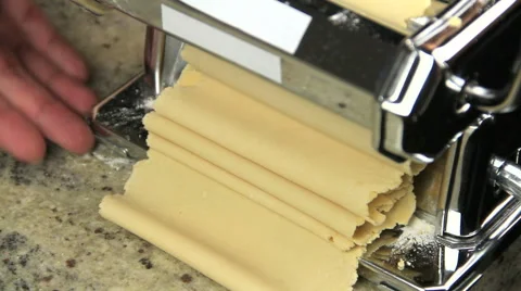 Dough Sheets Out Of Pasta Maker Stock Footage 40027428