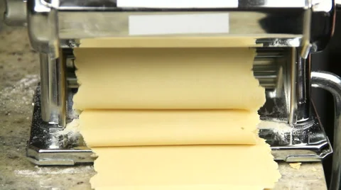 Dough Sheets Rolls Out Of Pasta Maker Stock Footage 40027743