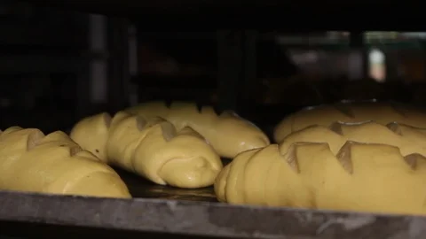 Dough sliced and prepped for baking Stock Footage 90833137
