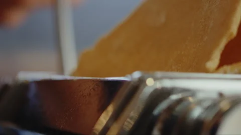 Dough slipping into flatting machine Stock Footage 274611704