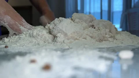 Dough on the table is worked with your hands Stock Footage 221271254