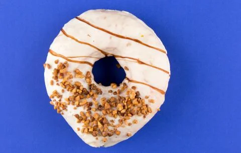 Doughnut on blue table Stock Photos