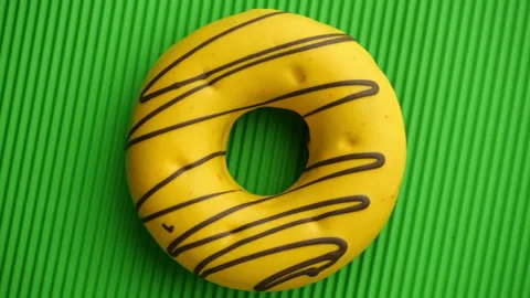Doughnut glazed close-up. Видео 139936970