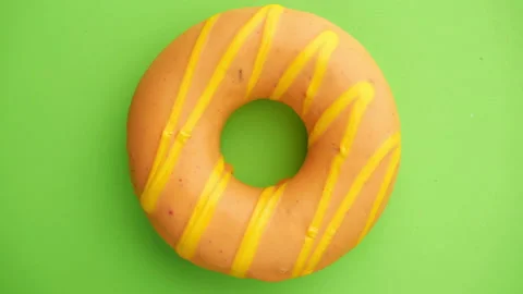 Doughnut glazed close-up. Video stock 144472085